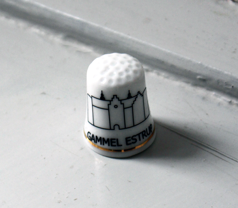 Fingerbøl med Gammel Estrup logo